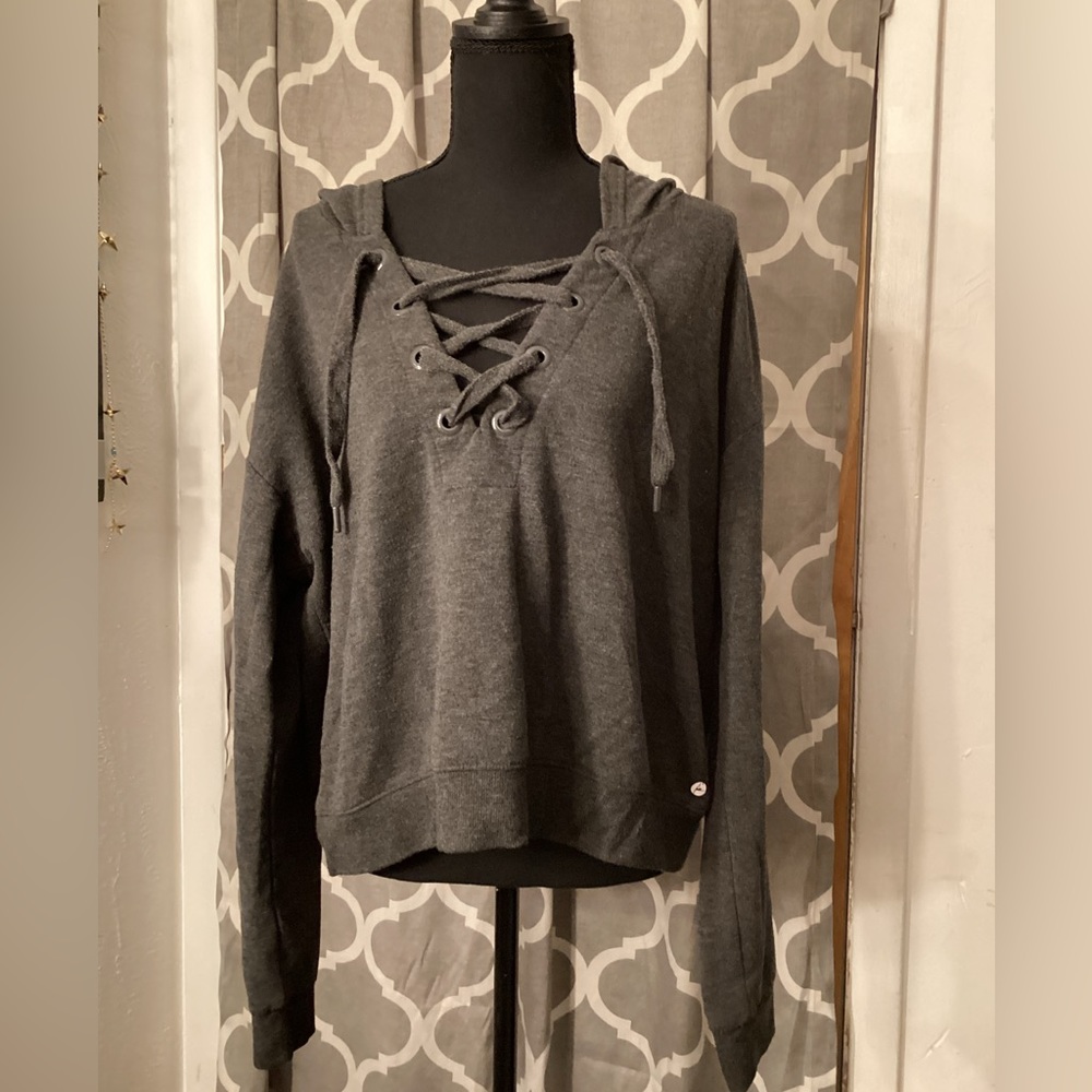 Grey Hoodie with Black stars on the side of the sleeves with hood